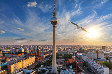 Aerial panorama of Berlin at sunset, downtown with the skyscrappers and the bridges, Germany.の写真素材