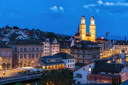 Skyline view on the GrossmÃ¼nster Romanesque-style Protestant church, ZÃ¼rich, Switzerland.の写真素材