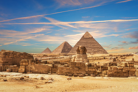 The Sphinx and the Pyramids, famous Wonder of the World in the sands of Giza desert, Egypt.の写真素材