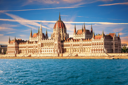 Hungarian Parliament building on Danube River in Budapest at sunset, Iconic Landmark of Hungary.の写真素材