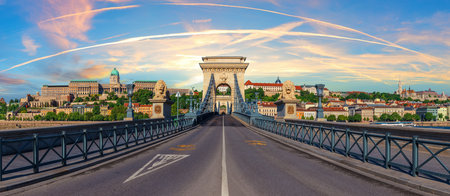 Chain Bridge in Budapest at sunset with Buda Castle and Matthias Church Panorama.の写真素材