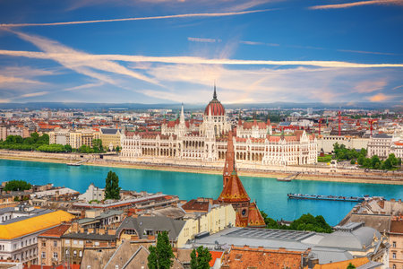 Budapest skyline with Hungarian Parliament and Calvinist church on the Danube.の写真素材