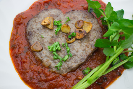Heart of steak with meat sauceの写真素材
