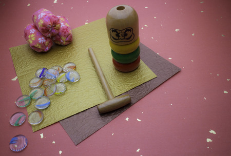 Daruma Otoshi and beanbags, marblesの写真素材