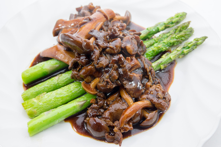 Asparagus saute with  Brown mushroom sauceの写真素材