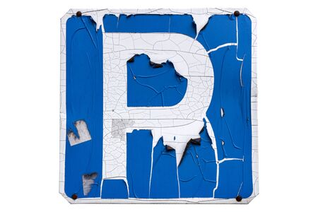 Very old 'Parking' road sign with cracks isolated on white.