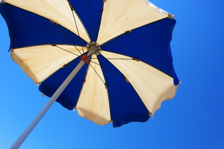 sunshade at the beach on a very sunny dayの写真素材
