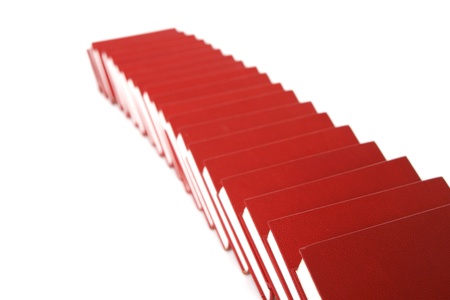 stack of red books isolated on whiteの写真素材