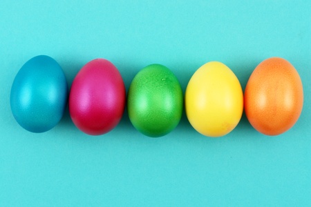 bright pastel colored easter eggs on  backgroundの写真素材