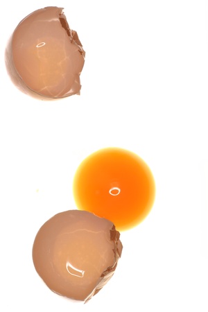 a broken egg on isolated white background