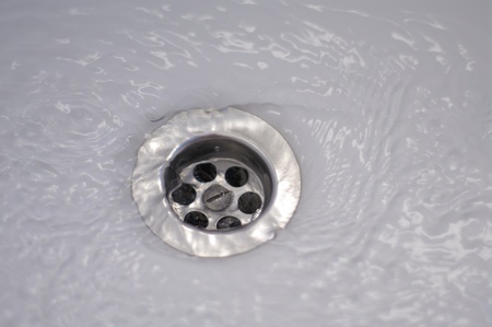 water drops falling from a shower indoors