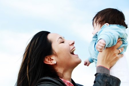 A young happy mother 22 years with her 4  month old son....の写真素材