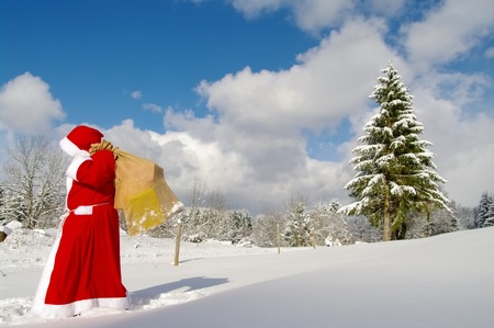 Santa Claus, Father Christmas in a beautiful winter landscapeの写真素材