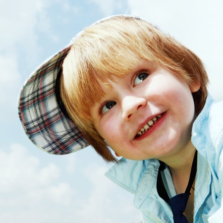 potrait of a two years old boy outdoorsの写真素材