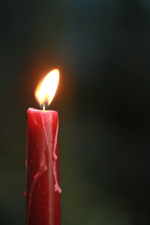 candles in snowの写真素材