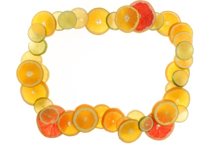 citrus fruits in slices forming a frame           の写真素材