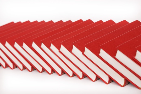 stack of red books isolated on whiteの写真素材