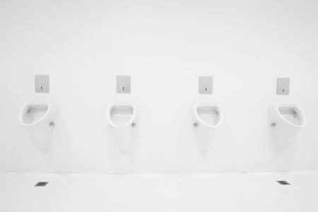 a clean new public toilet room emptyの写真素材