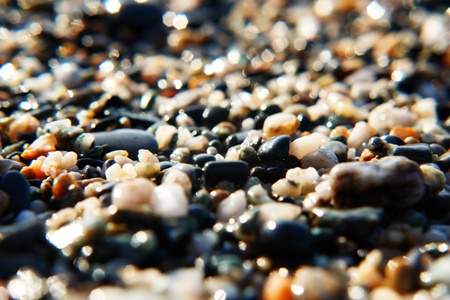 pebble beach in the bachground the oceanの写真素材