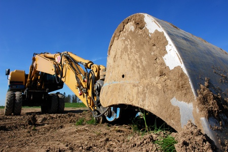 close-up of a big excavatorshovel out side