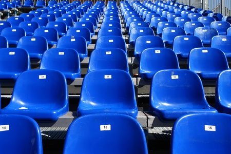 Rows of blue seats on modern stadiumのeditorial素材