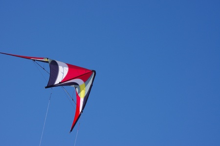 sport colorful stunt Kite in clear blue skyの写真素材