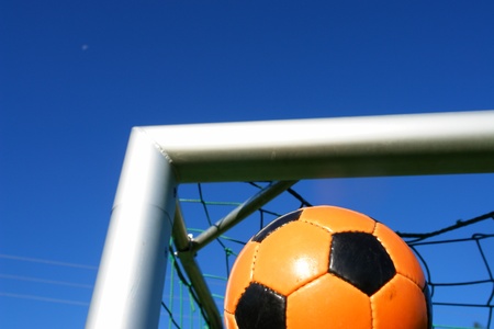 Goal. a soccer ball in a net. outdoorsの写真素材