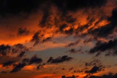 storm, bad weather clouds at sunset          の写真素材