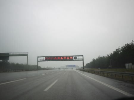 Long road on a foggy day