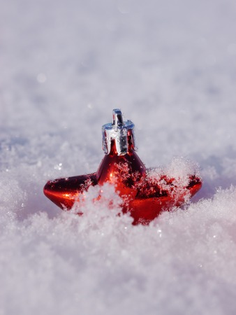 Christmas decoration outside in real snow winterの写真素材