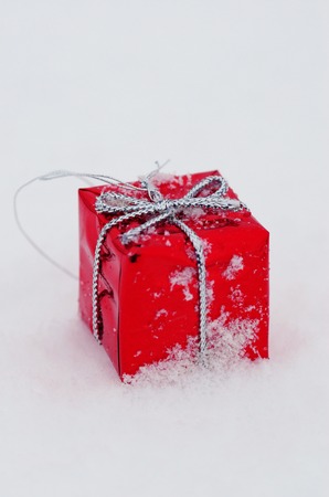Christmas decoration outside in real snow during snowfall