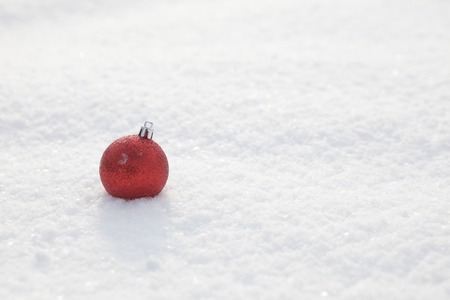 Christmas decoration outside in a snowy landscapeの写真素材