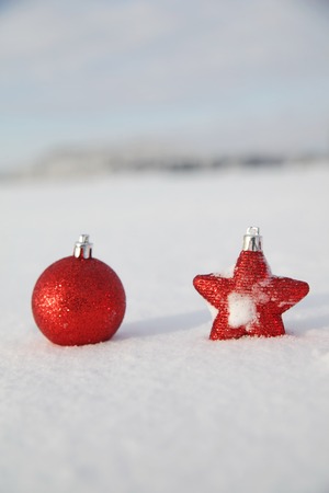 Christmas decoration outside in a snowy landscapeの写真素材