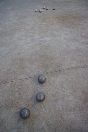 Metal spheres for game in boccia on sandの写真素材