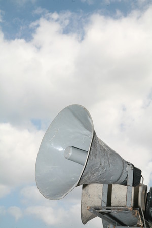 Loudspeaker against the sky clouds out sideの写真素材