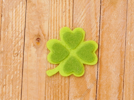 Green clover leaf with green heartsの写真素材
