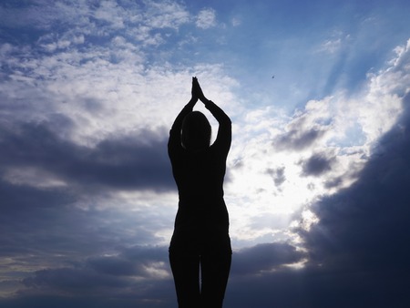 yoga silhouette sky welcome freedomの写真素材