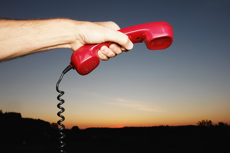 red phone in landscape