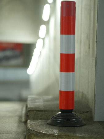 traffic cone inside a garageの写真素材