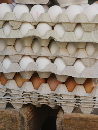 Brown egg trays at the marketの写真素材