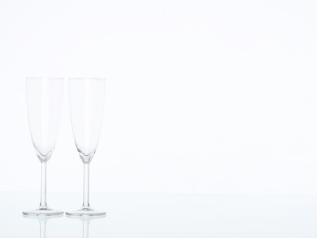 Champagne pouring in two glassesの写真素材