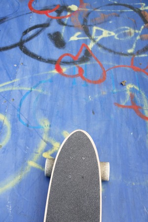 Detail of skateboard on the groundの写真素材