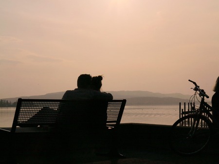 a couple by a lakeの写真素材