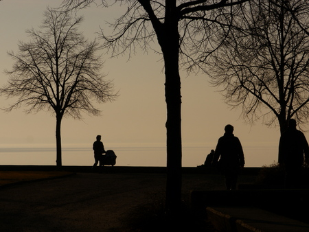 silhouette people lakeの写真素材