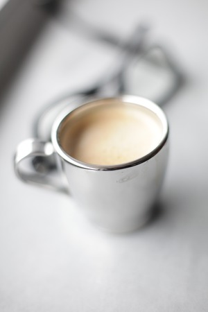 Espresso pouring into a cupの写真素材
