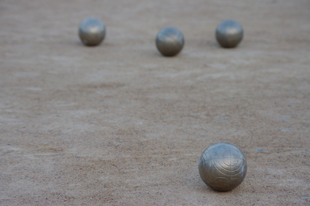 Metal spheres for game in boccia on sandの写真素材