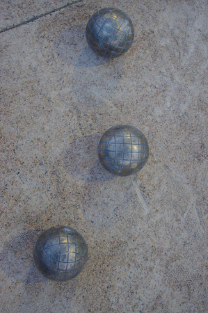 Metal spheres for game in boccia on sandの写真素材