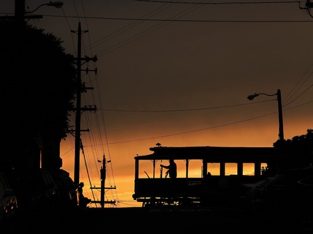 San Francisco Cable Trolley Car moves through the street California people mover transportationの写真素材