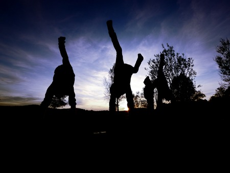 Boy dancing on the streetの写真素材