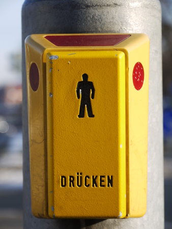 a pedestrian light for humans which would like to cross the street